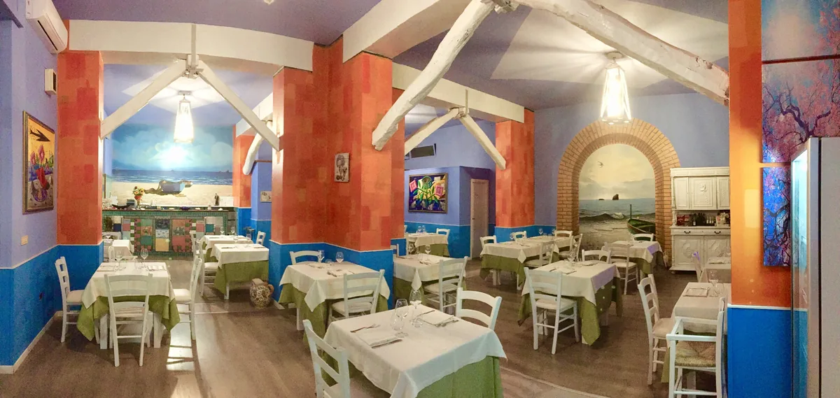 The dining room of Locanda di Mare in Amantea — the family restaurant from 1998 to 2022
